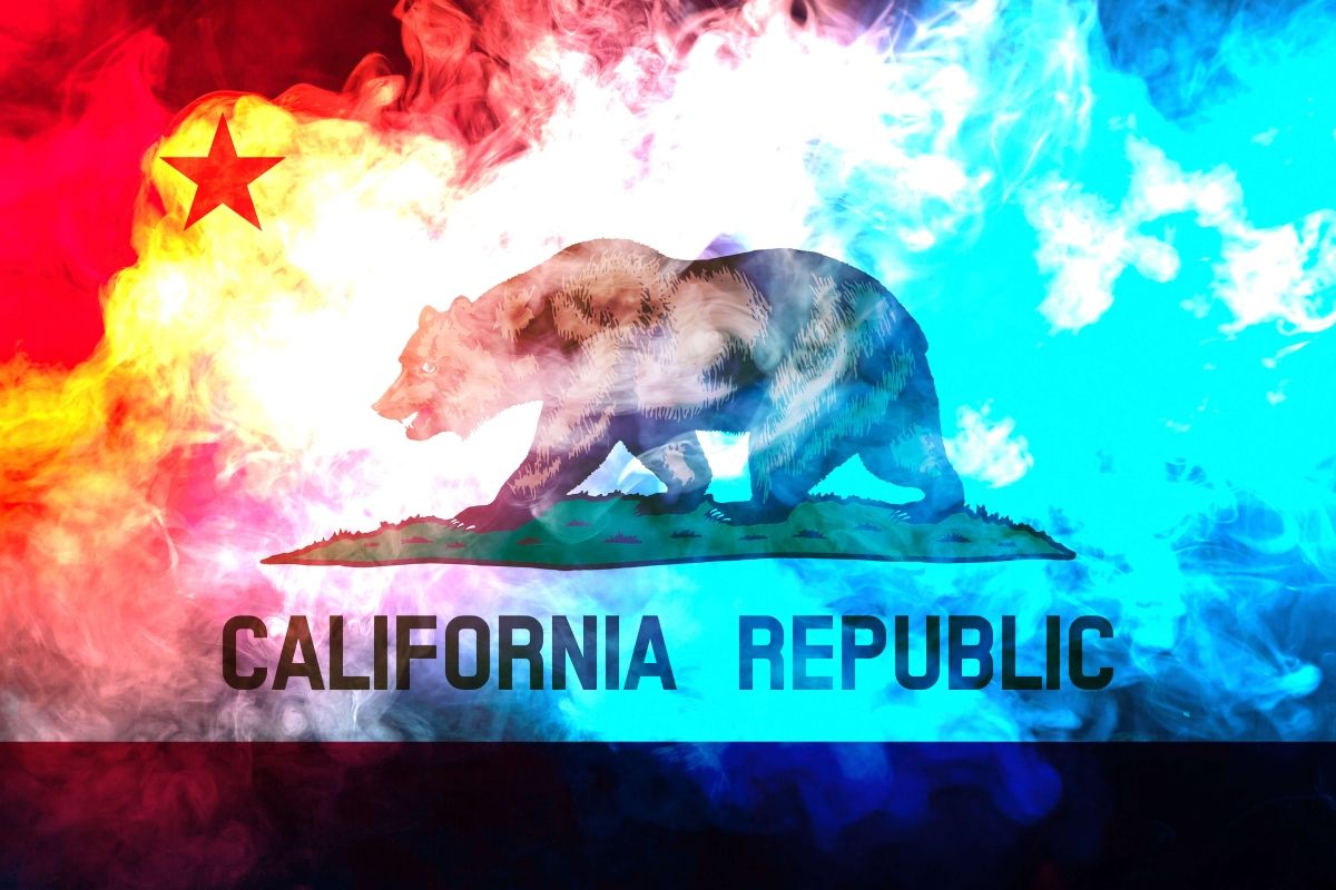 Image of California state flag amid smoke