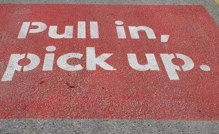 Image of a curbside pickup sign