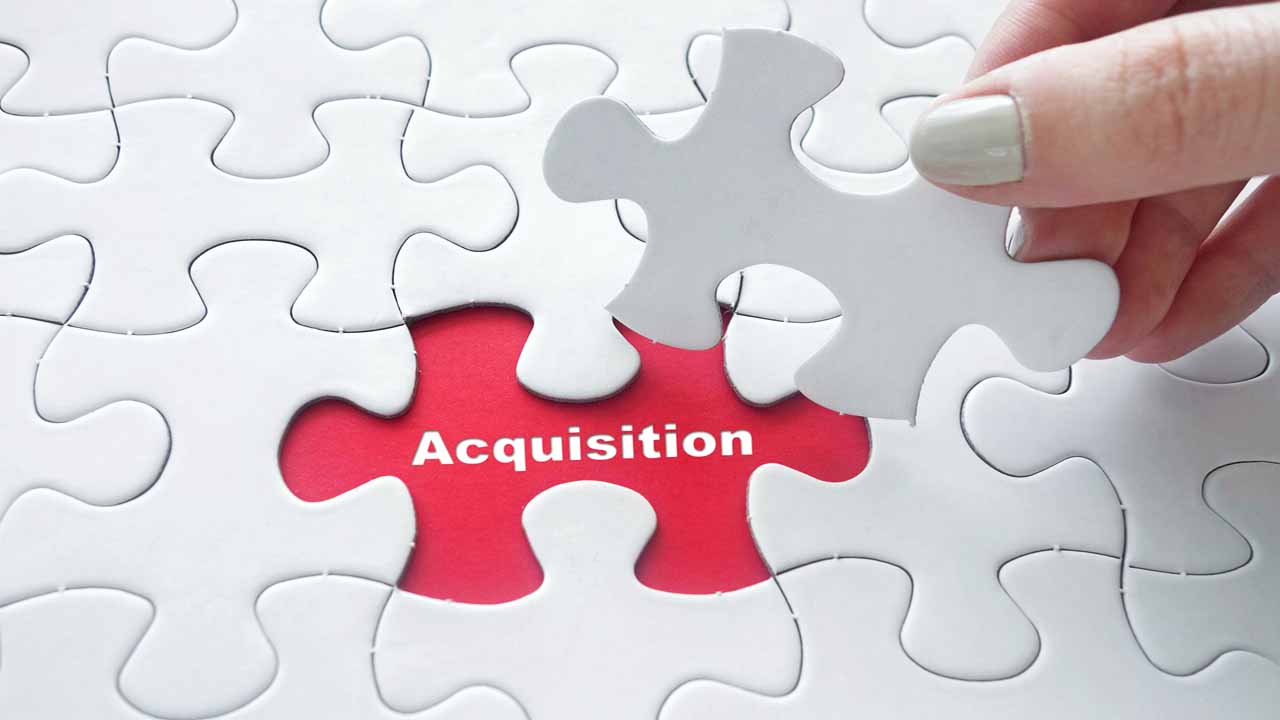 Image of a jigsaw puzzle with the word Acquisiiton