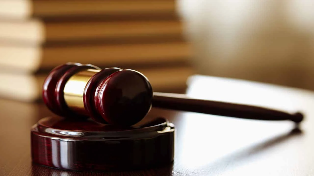 Image of a gavel in a courtroom