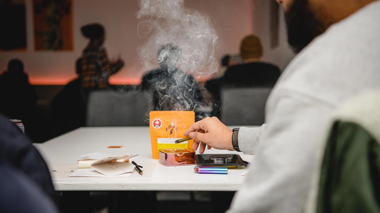Image of a person smoking cannabis.