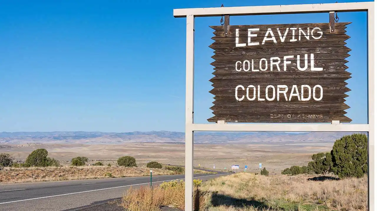 Image of sign that reads "Leaving Colorful Colorado."