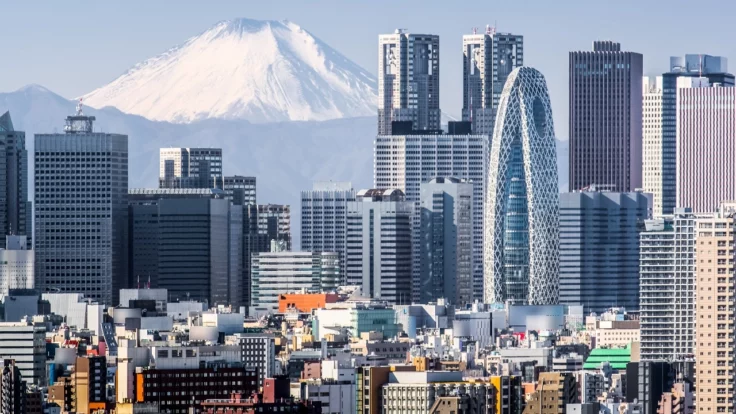 Image of downtown Tokyo skyline with Mount Fuji in background