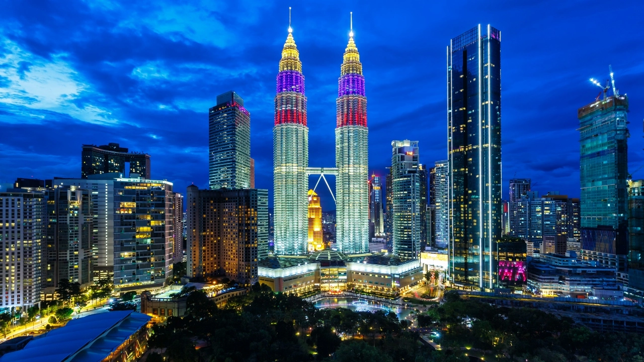 Image of Petronas Twin Towers at twilight in Kuala Lumpur, Malaysia