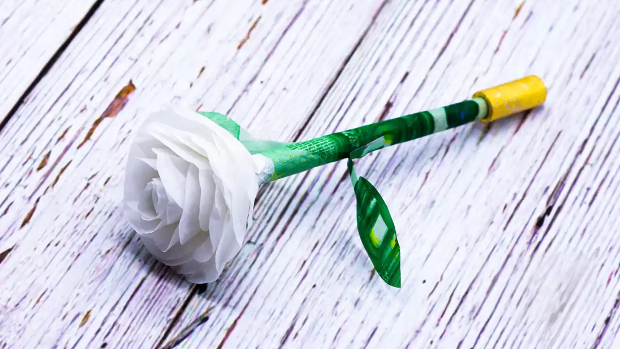 Image of a pre-roll shaped like a white rose and sold by Made in Xiaolin.